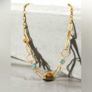 Elegant Boho-Chic Necklace with Blue Evil Eye Beads.